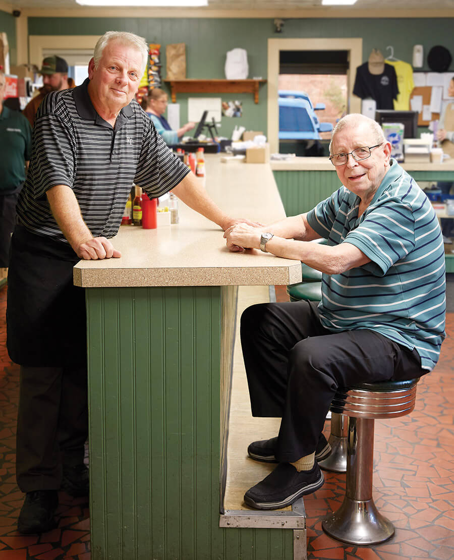 Wayne and Rick Monk inside Lexington Barbecue
