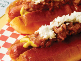 Carolina hot dogs topped with mustard, chili, and slaw