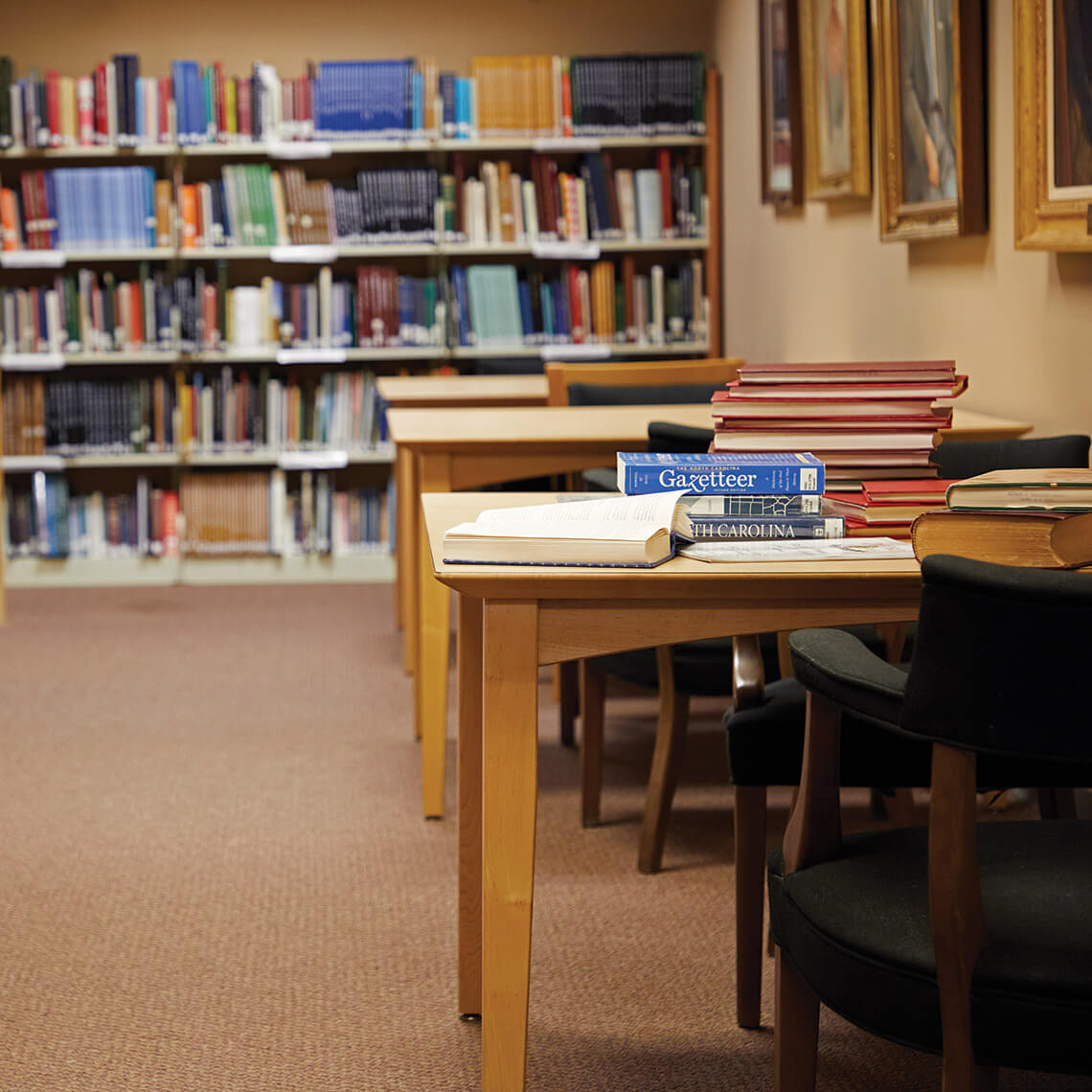 Table in the North Carolina Room with books: The North Carolina Gazetteer and others.