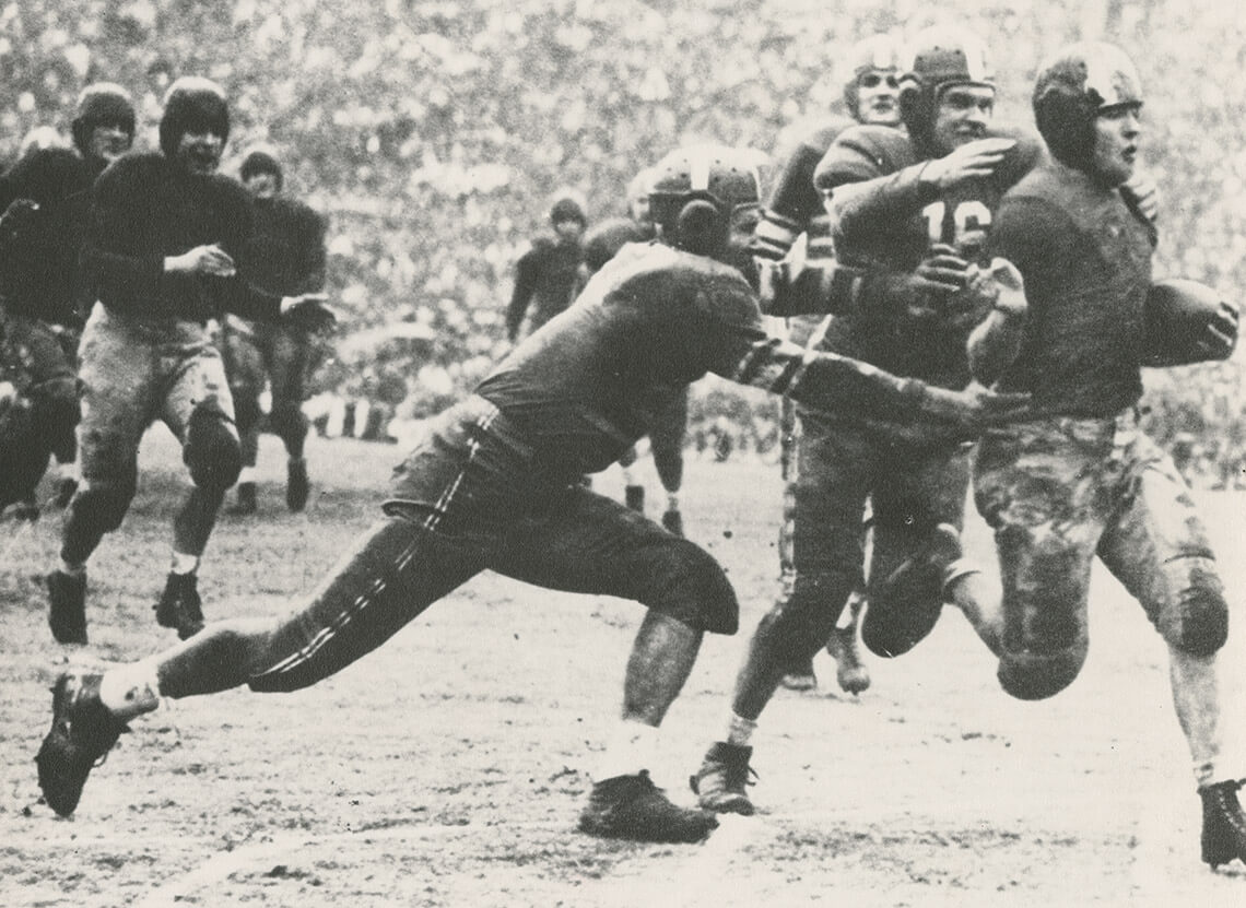 The Oregon State College Beavers score a touch-down at Duke Stadium (now Wallace Wade Stadium) during the 1942 Rose Bowl.