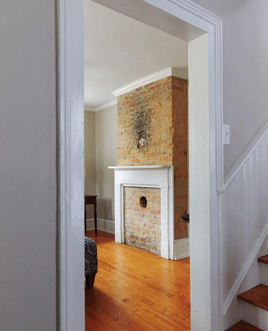 The fireplace and mantel inside the restored Robert Price home.