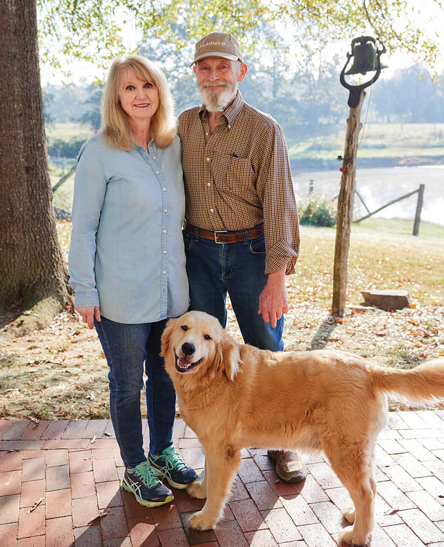 Tim Brooks, his wife Debbie, and their dog Stella.