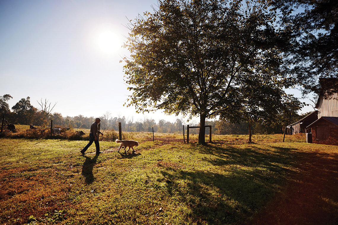 Tim Brooks makes the rounds on his family farm in Alamance County