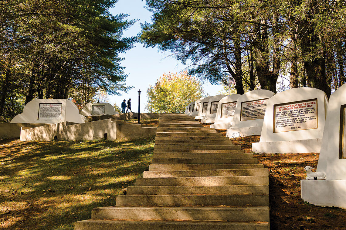 Monuments leading the path up to Prayer Mountain in Fields of the wood