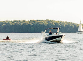 Boat pulling innertube on Lake Norman