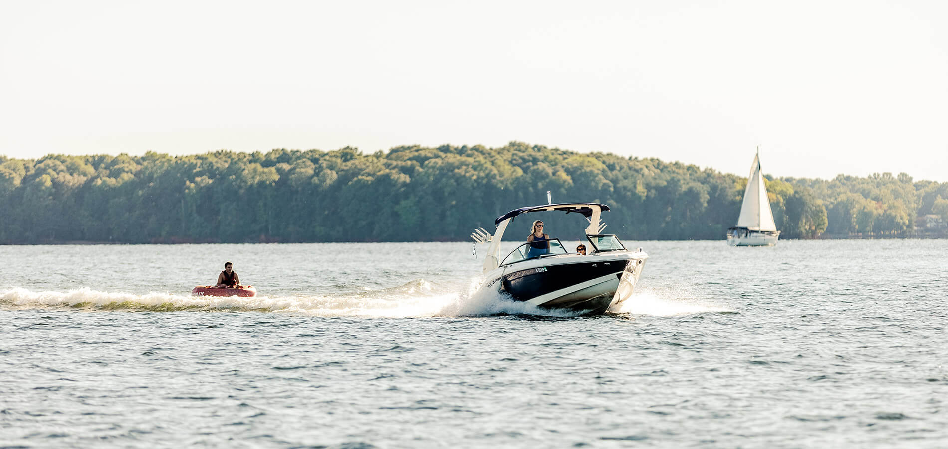 Boat pulling innertube on Lake Norman