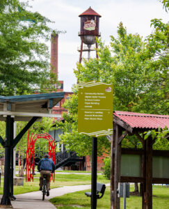Man bikes along the Danville Riverwalk Trail in Danville, Virginia