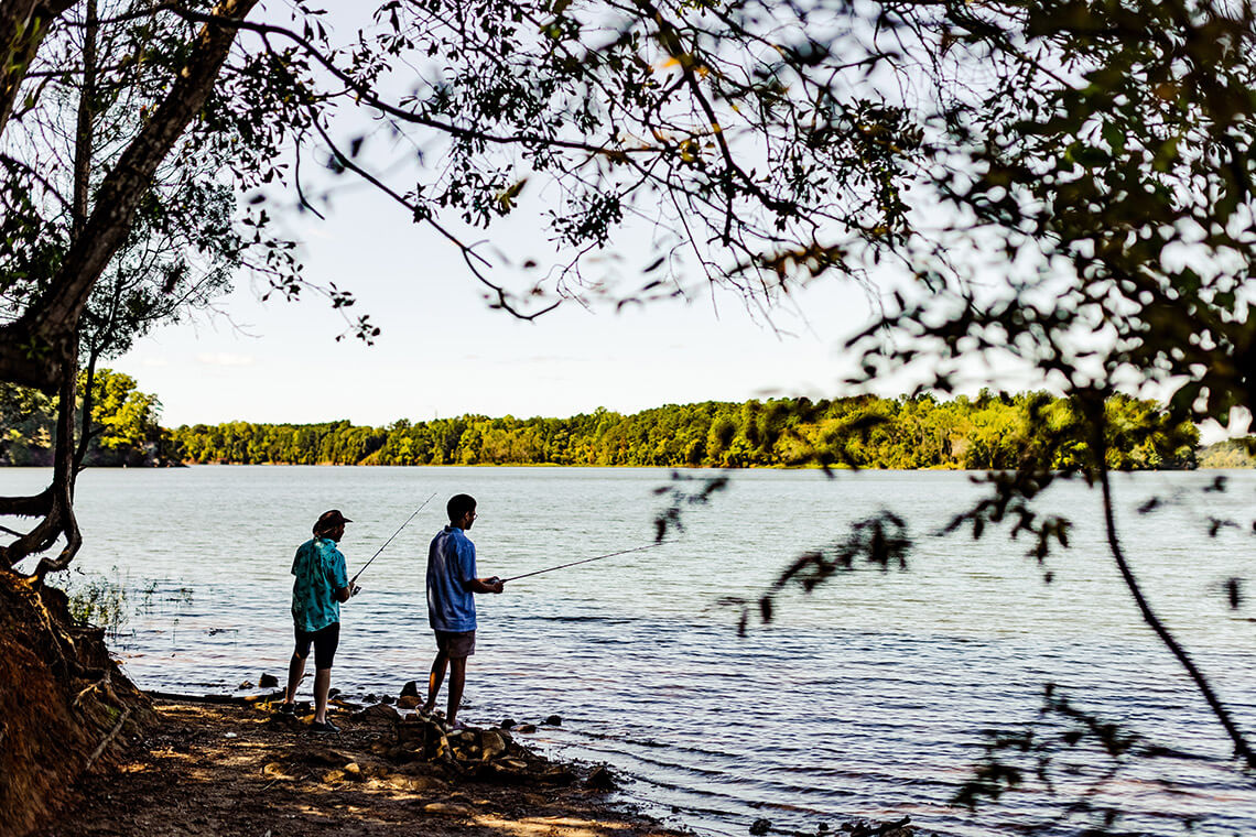 People fish at the Latta Nature Preserve