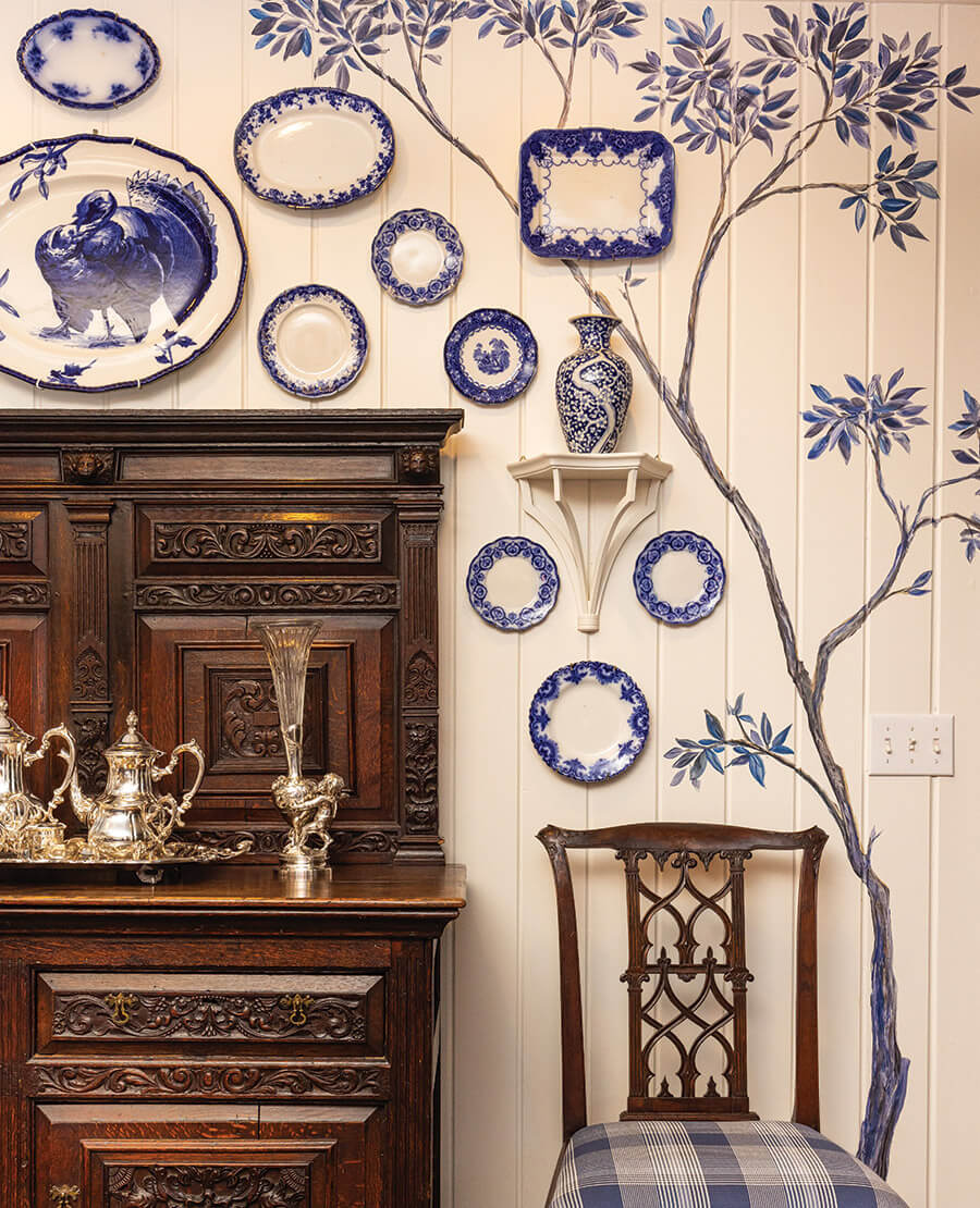 Kathryn Greeley's blue and white china collection on the wall of her kitchen