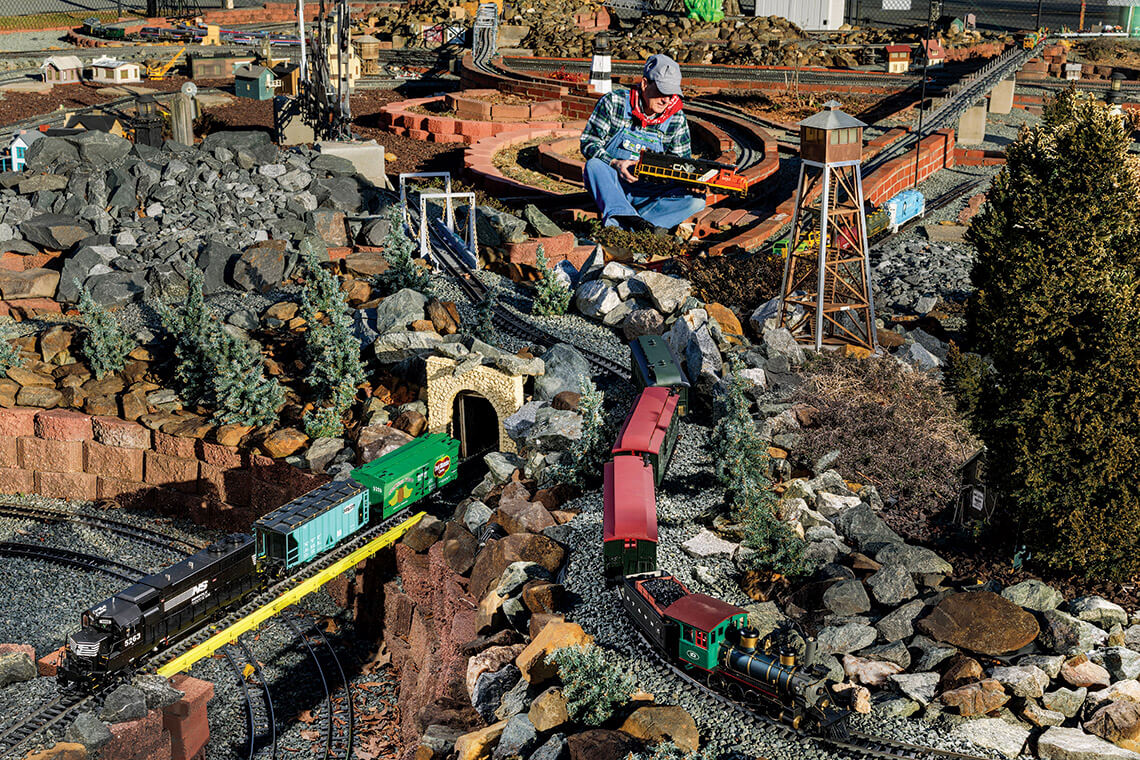 The sprawling landscape of the Gibsonville Garden Railroad includes replicas of North Carolina landmarks dotting the tracks.