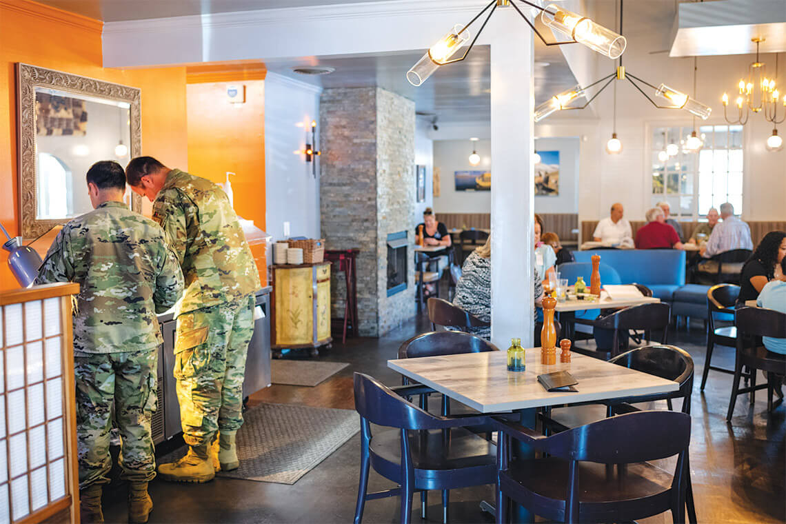 Men in uniform pick up lunch at Los Fogones