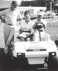 Rose Buddies drive visitors around Elizabeth City in a golf cart