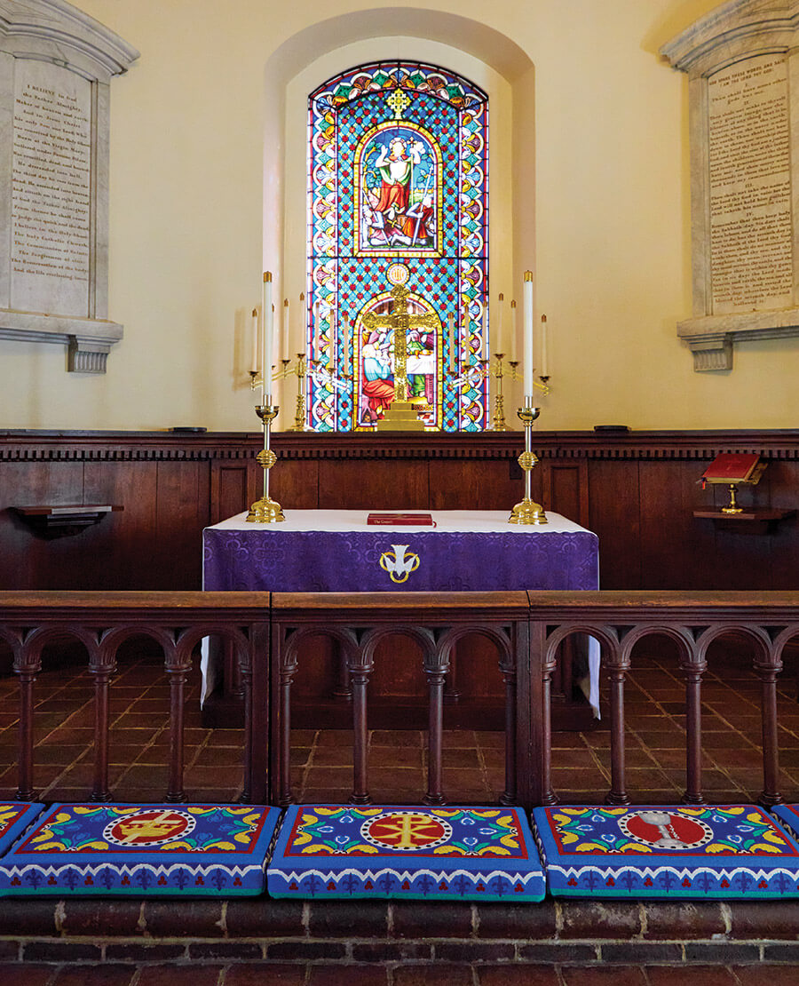 Colorful kneelers at the altar of St. Paul's Episcopal Church