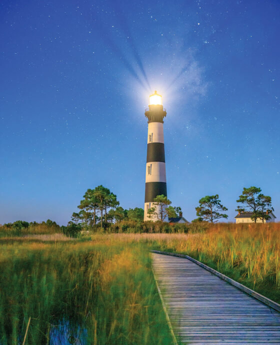 The Bodie Island Lighthouse shines at night