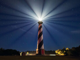 The Cape Hatteras Lighthouse shines bright at night