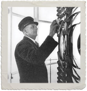 Unaka Jennette tending to the lens in the Hatteras Lighthouse