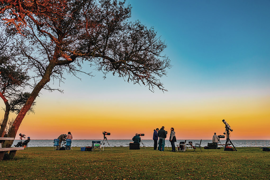 At dusk, Crystal Coast Stargazers set up their telescopes at Cape Lookout