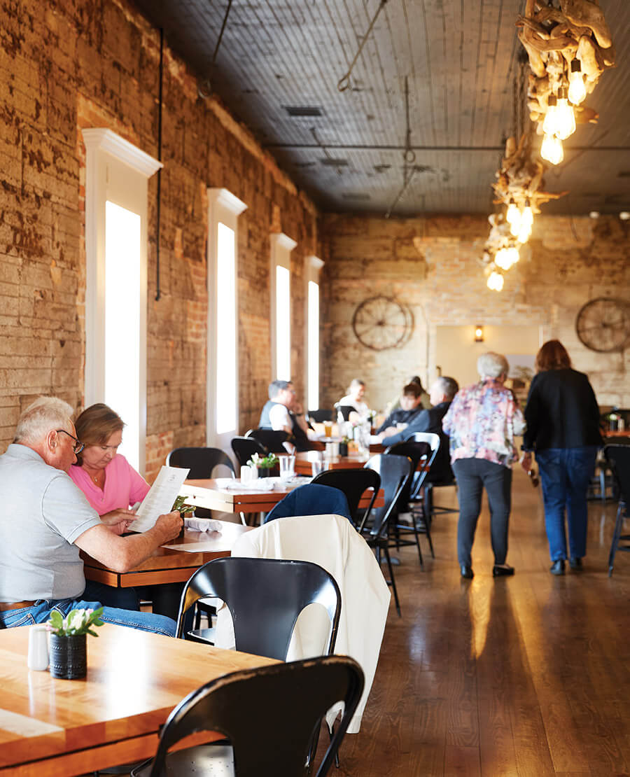 Guests in the dining room at The Herringbone on the Waterfront