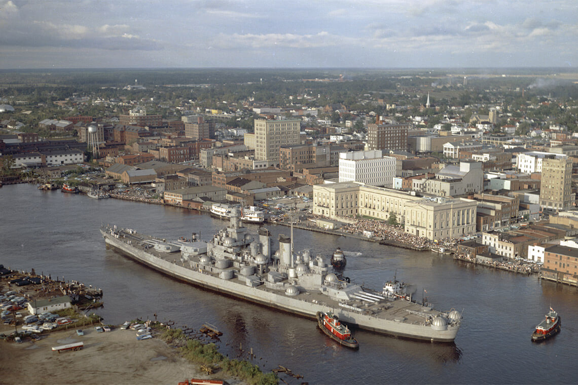The Battleship North Carolina enters Wilmington in 1961