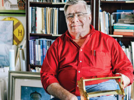 John Havel with books, documents and replicas associated with the Hatteras Lighthouse