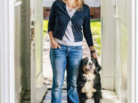 Meghan Agresto and dog inside the Currituck Beach Lighthouse