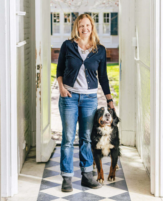 Meghan Agresto and dog inside the Currituck Beach Lighthouse