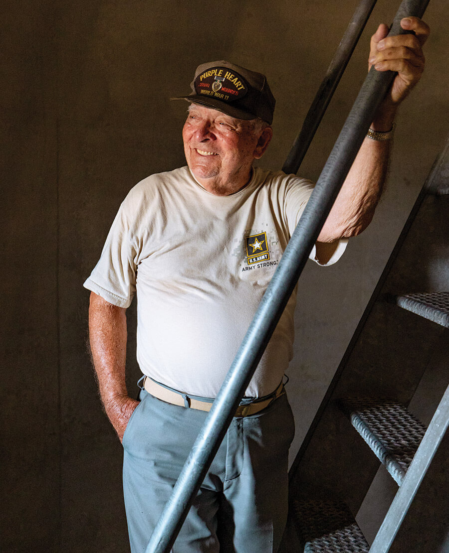 Chris Christensen smiles before he starts climbing the ladders in the Oak Island Lighthouse