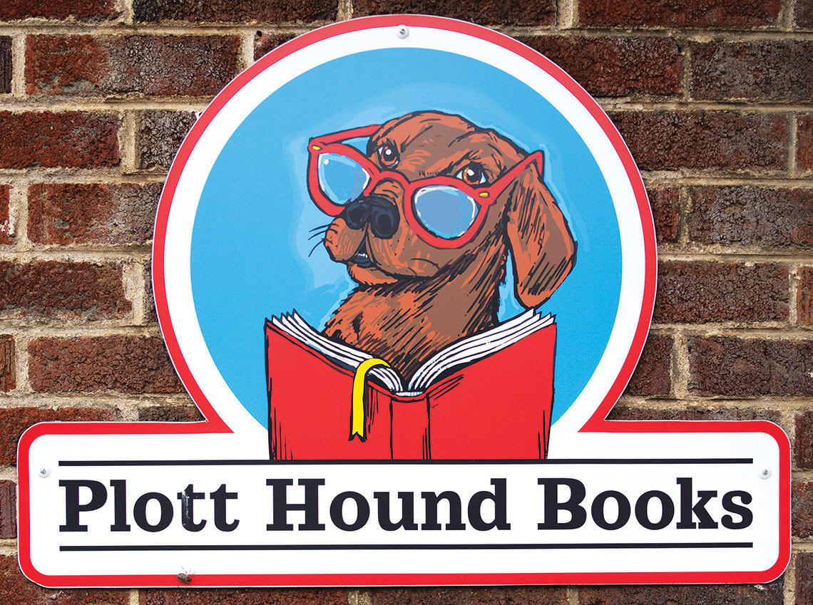 The sign for Plott Hound Books