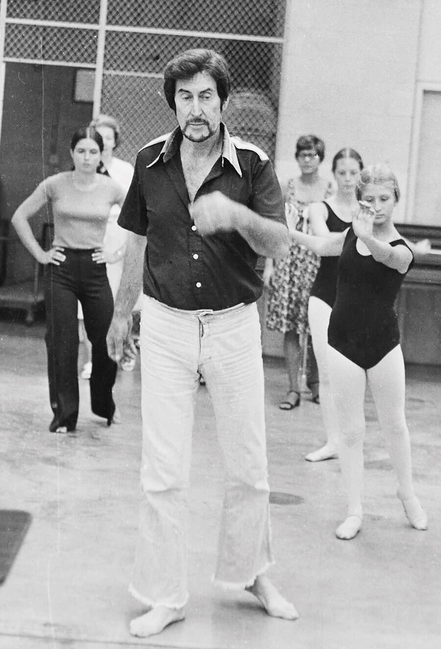 Louis Nunnery instructs dance students through steps at his school of dance