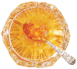 Spoon in a dish of honey