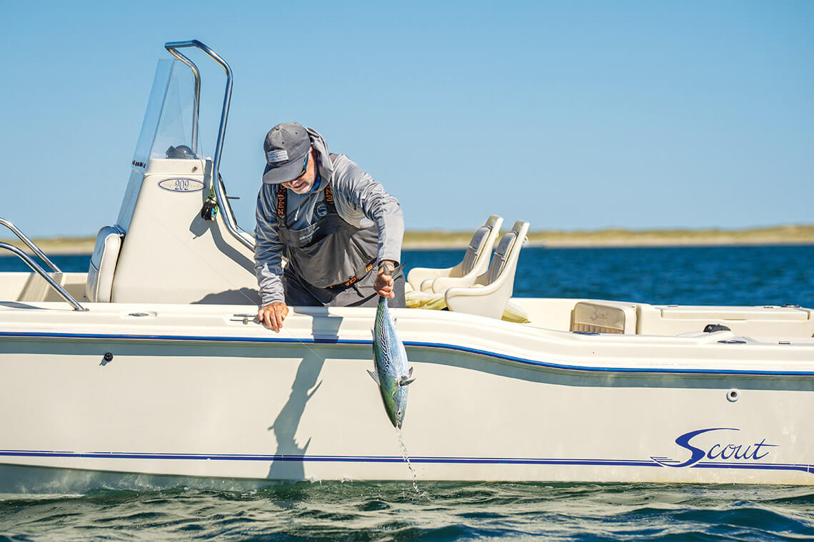 The author catches a fish off of Cape Lookout.