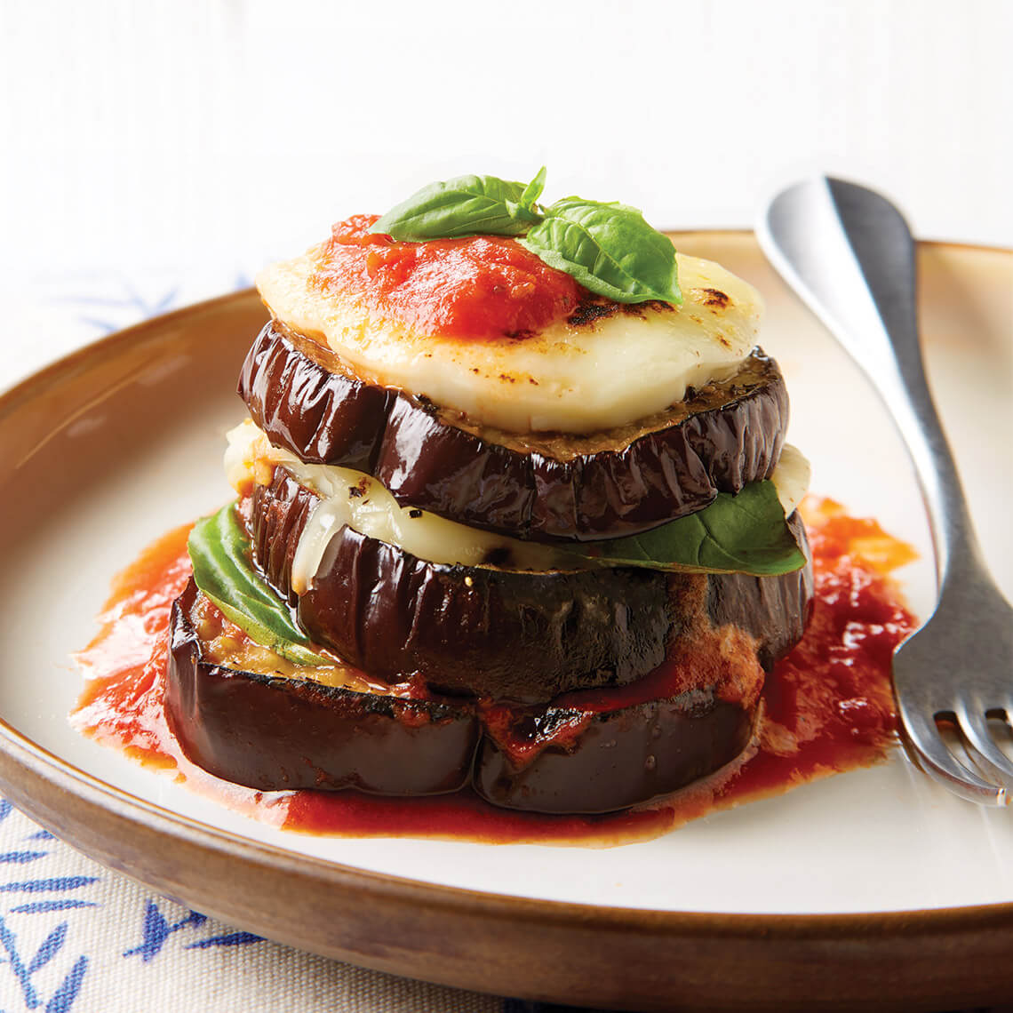 Eggplant-fontina stack on a plate