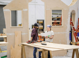 Scene technology students Andrew Johnson and Alyssa Landry design costumes at UNCSA