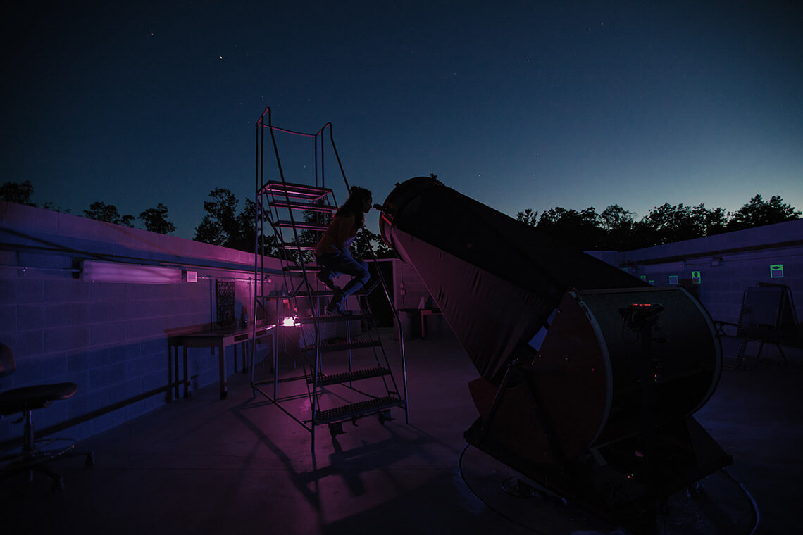 Person stargazes at the Bare Dark Sky Observatory