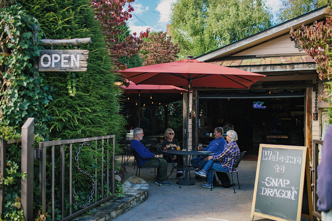 People on the patio at Snap Dragon