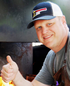 Adam Hughes, one of the featured pitmasters at the Pinehurst Barbecue Festival