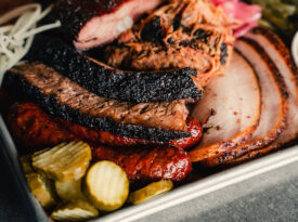 Tray of smoked meats, pickles, and mac 'n' cheese from Prime Barbecue, one of the featured restaurants at the Pinehurst Barbecue Festival