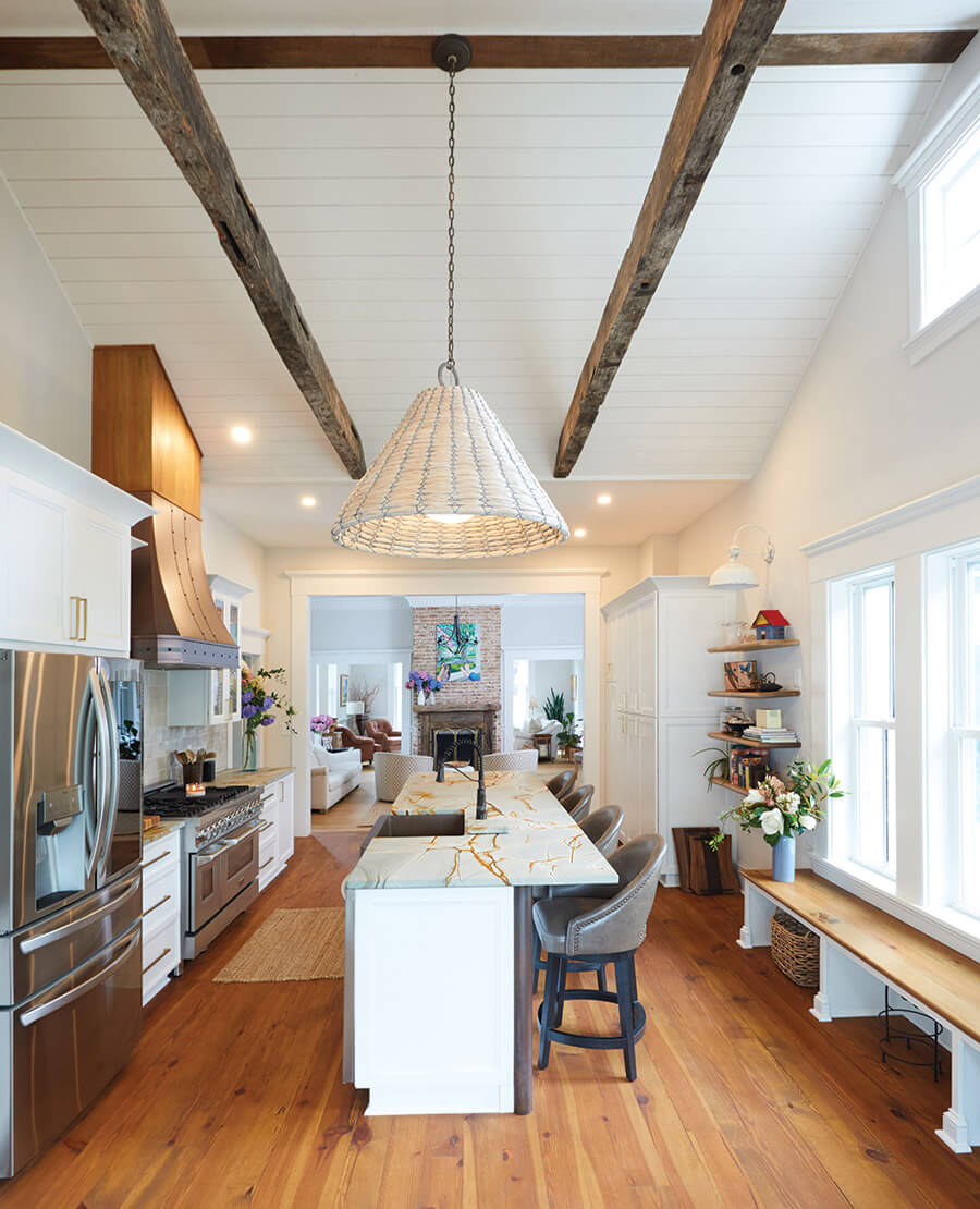 The Whichards' kitchen with exposed beams in the ceiling