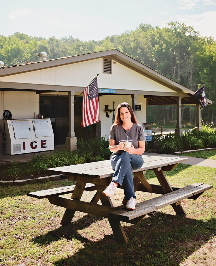 Alicia Chamberlain sits outside The Lakeside Grill at Lake Holt