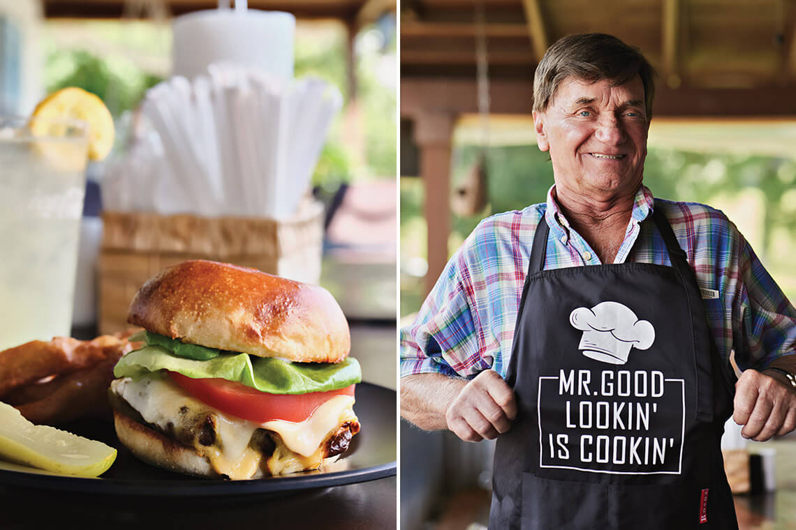 A cheeseburger and Ollie Hayes wearing his Mr. Good Lookin Is Cookin apron