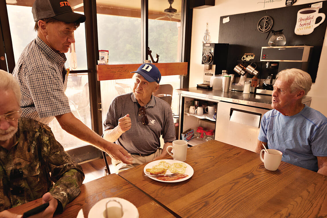 Lakeside Grill at Lake Holt regulars Rex Temple, Ollie “OC” Hayes, Sidney Baker, and Johnny Blalock