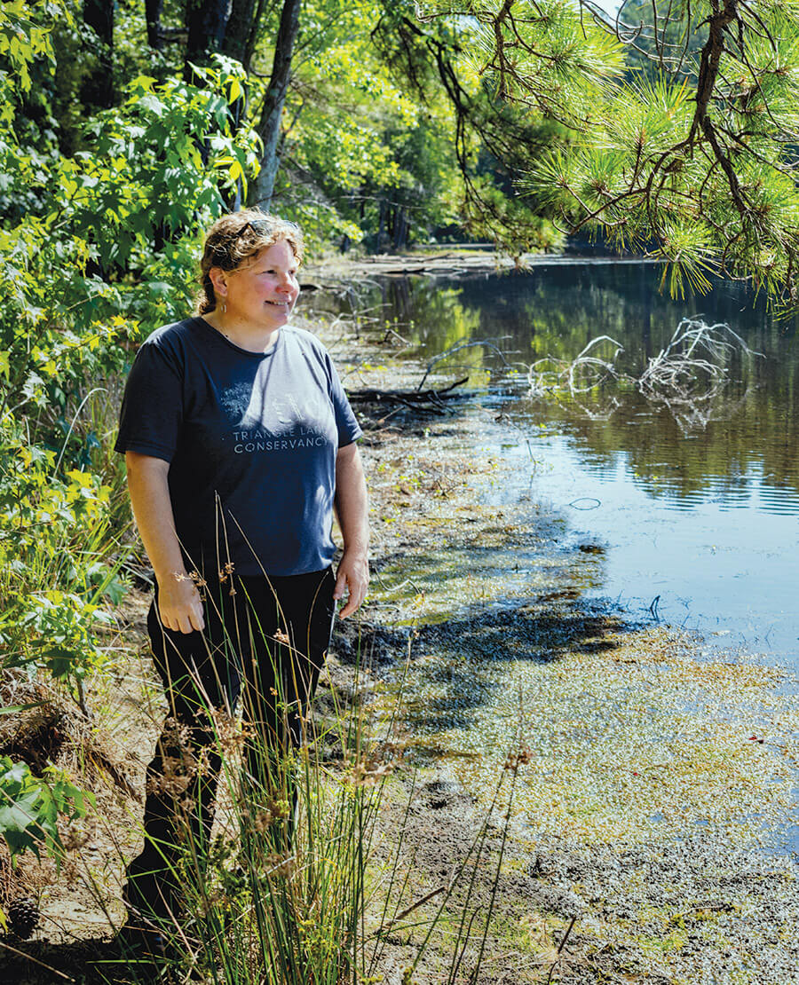 Leigh Ann Hammerbacher surrounded by the swamp-like setting at The Harricanes