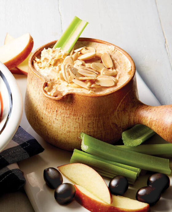 Little crock of port cheese spread, served with celery, apple slices, and olives