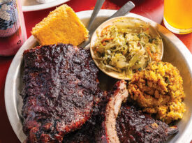 plate with blueberry chipotle ribs, cornbread, slaw, and corn pudding at 12 Bones in Asheville