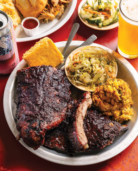 plate with blueberry chipotle ribs, cornbread, slaw, and corn pudding at 12 Bones in Asheville