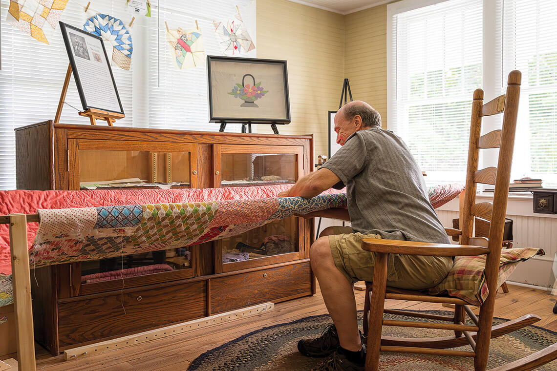 When Dave Russell isn’t working on a quilt in the Textile Room, he’s telling stories about the Monteith sisters to visitors at the Appalachian Women’s Museum.