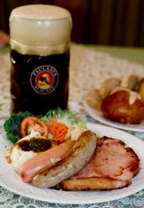 A plate of German food and a beer