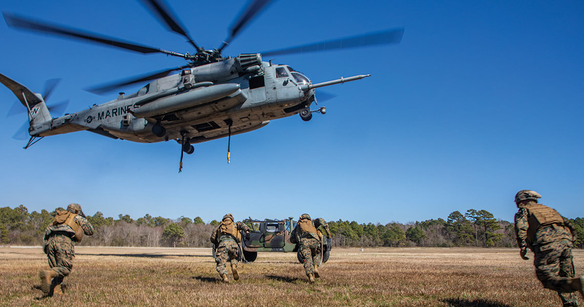 Camp Lejeune Marines participate in exercises like helicopter support team training.