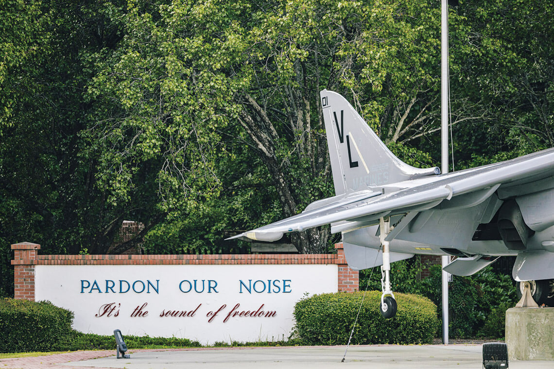 Pardon Our Noise, It's the Sound of Freedom entrance sign at Marine Corps Air Station Cherry Point