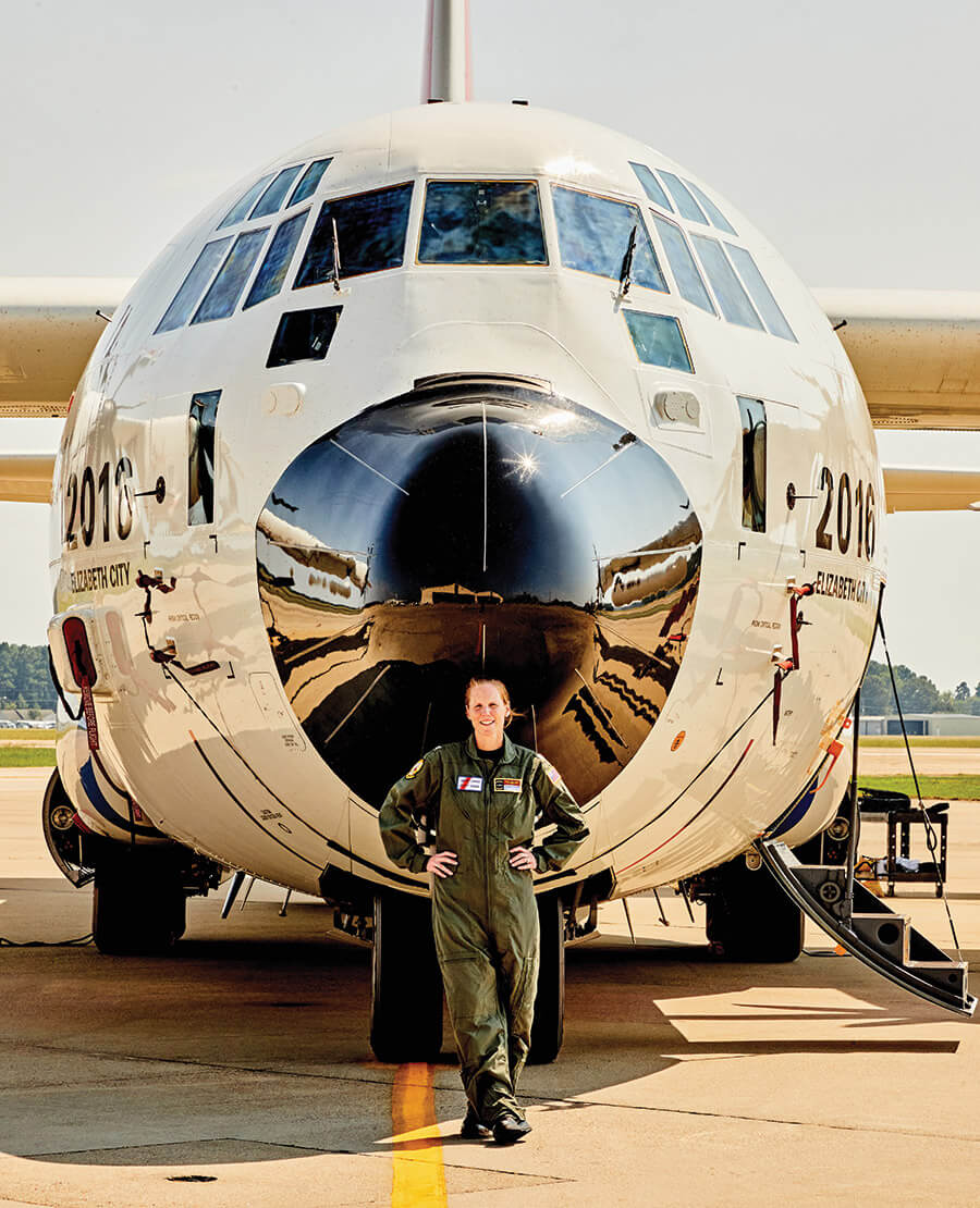 Air Station Elizabeth City Commanding Officer Catherine Carabine pilots the C-130J